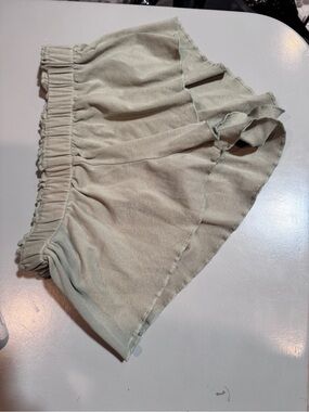 Edikted Sage Green Ruffle Hem Shorts